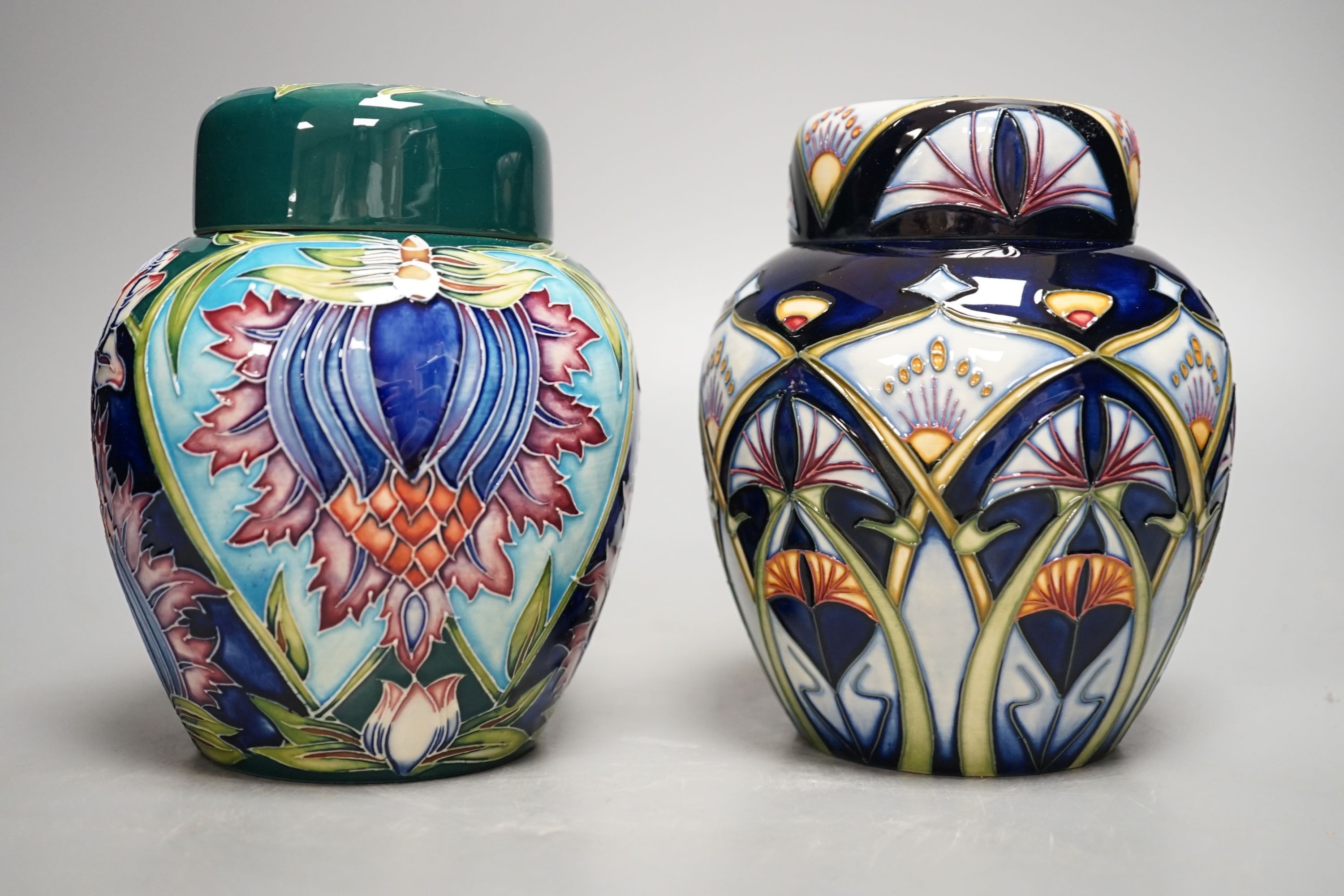 Two Moorcroft trial ginger jars and covers, signed Rachel Bishop and Shirley Hayes, 2001 and 2002, 16cm., with boxes
